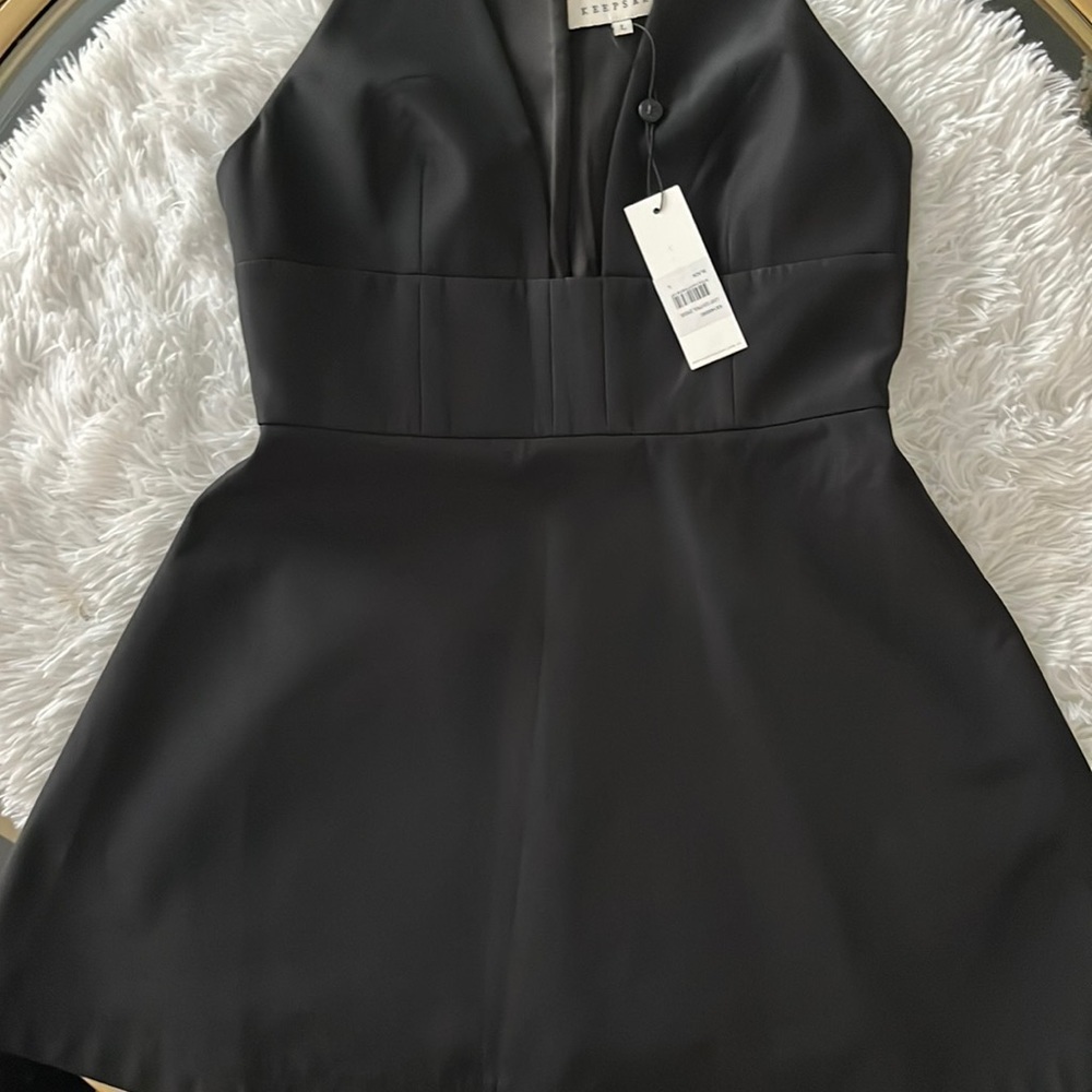 (A) New with tags size large (fits like a medium) black dress